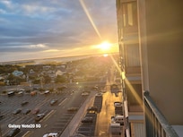 The sunset off the balcony. A little hard to capture but lol I death grip on my phone to get it lol