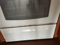 Stove had visible corrosion in the bottom drawer.