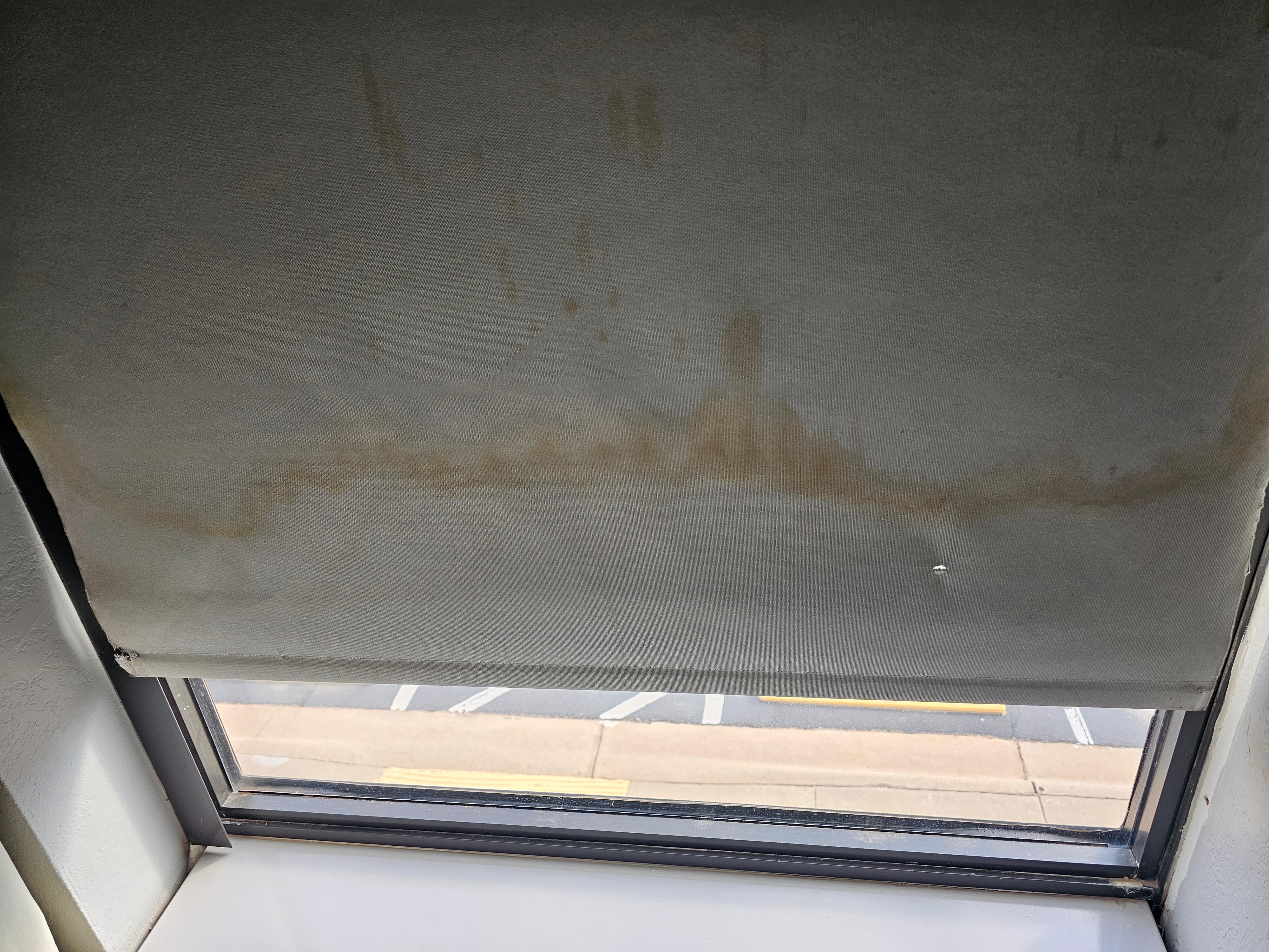 Blinds had ugly stains.