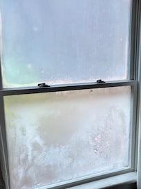 Moisture between panes of window.