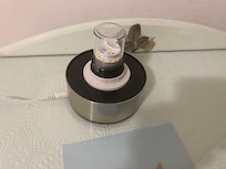 Lamp on nightstand table without globe