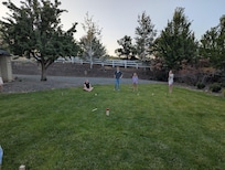 Kubb on the lawn. Grown ups won!