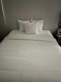 Only 3 pillows available on each bed