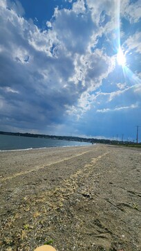 View looking down to the right of the house, public beach area