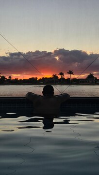 Sunset from in the pool