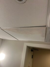 Ceiling panel falling away.