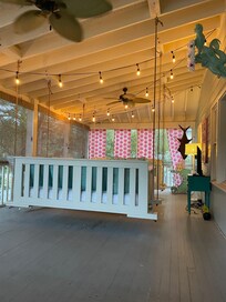 Front porch with very cozy bed swings, great place for a snooze!