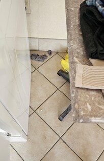 No trash can to throw lint/ trash in from the dryer so people throw it on the floor.