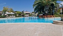 Pool with restaurant at top