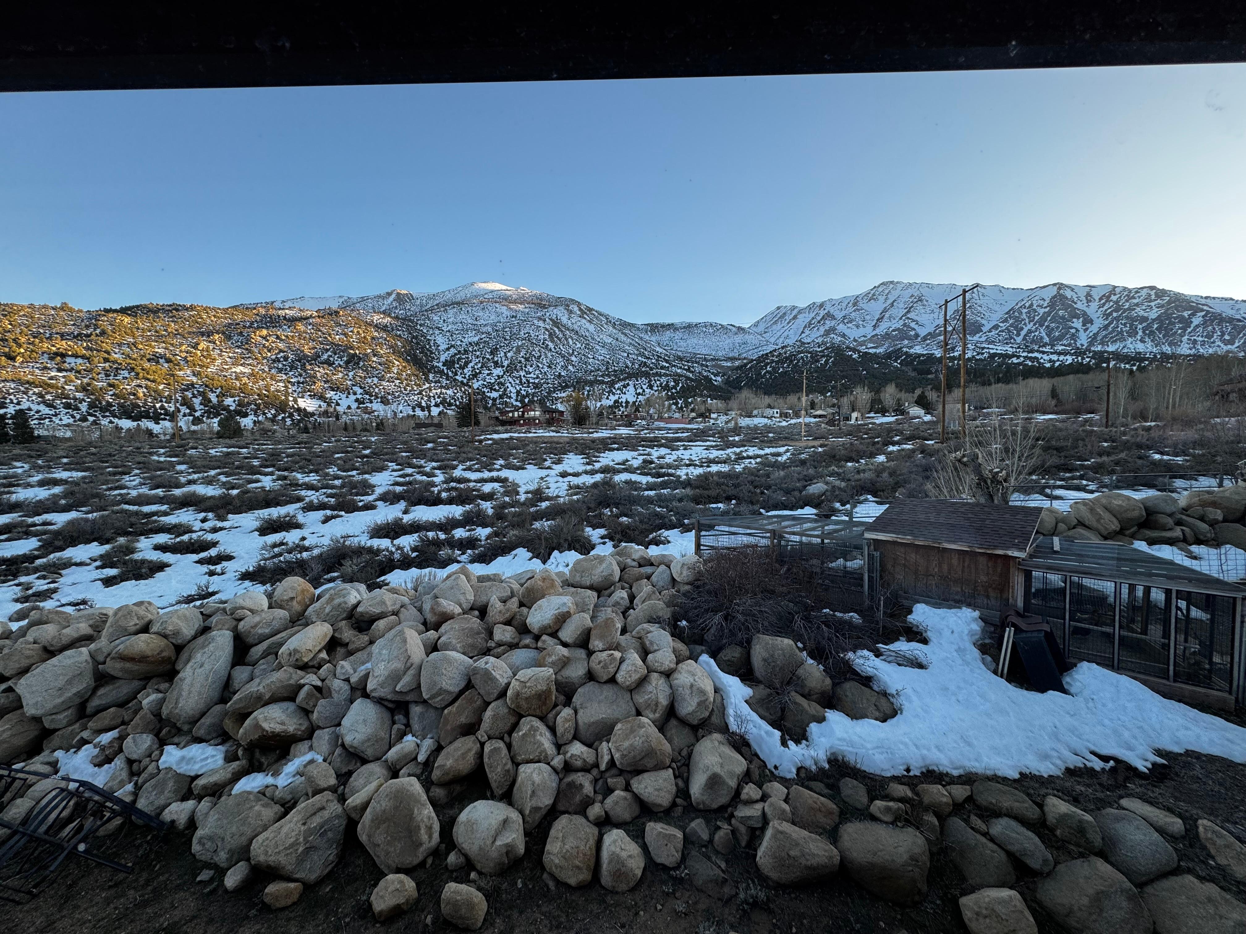 Daytime view of the mountain behind the building. 