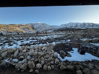 Daytime view of the mountain behind the building.
