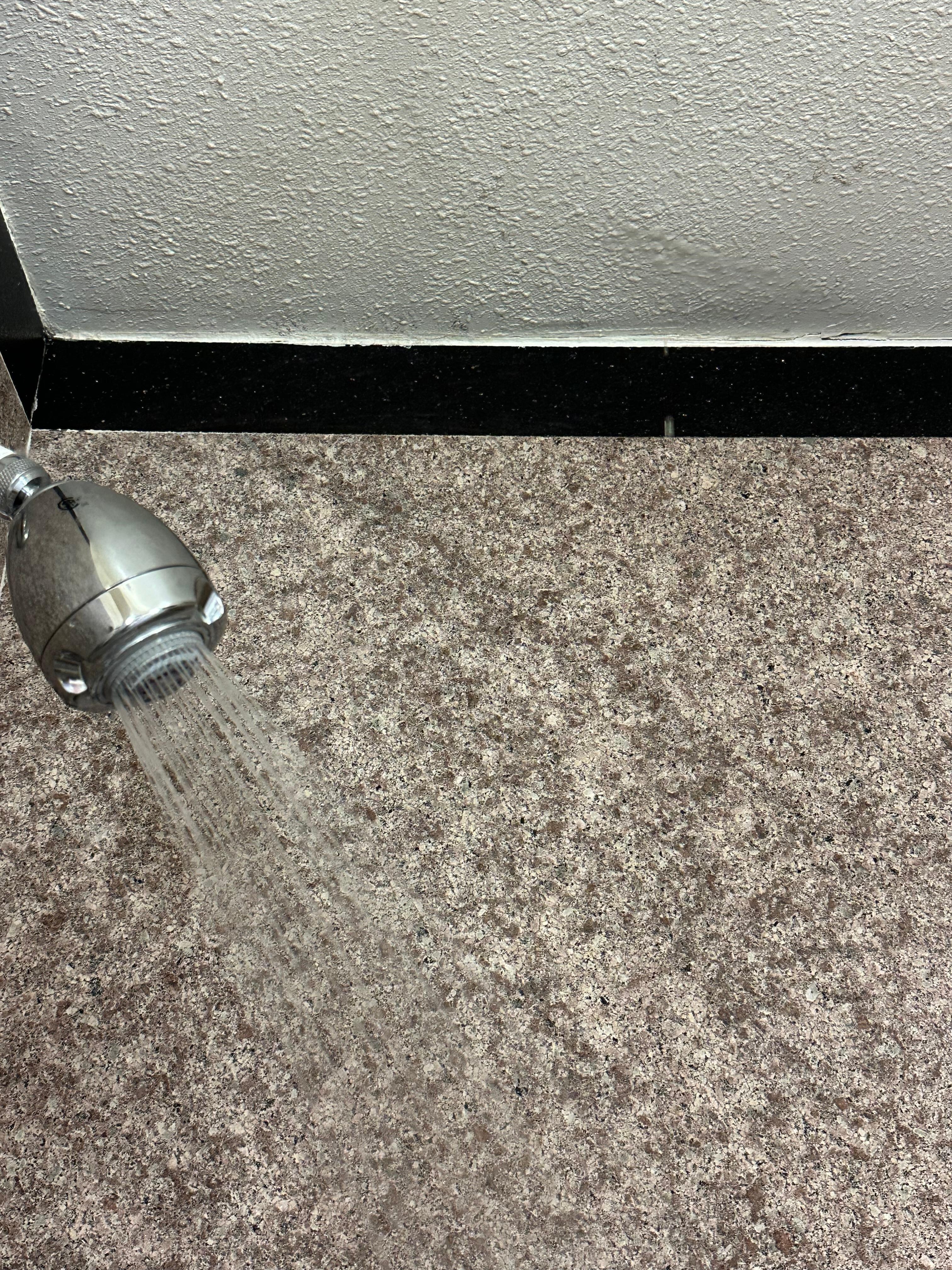 Had a leak at the showerhead wetting the ceiling.. drops of water from the ceiling falling on you as you showered