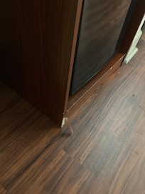 Fridge cabinet falling apart.