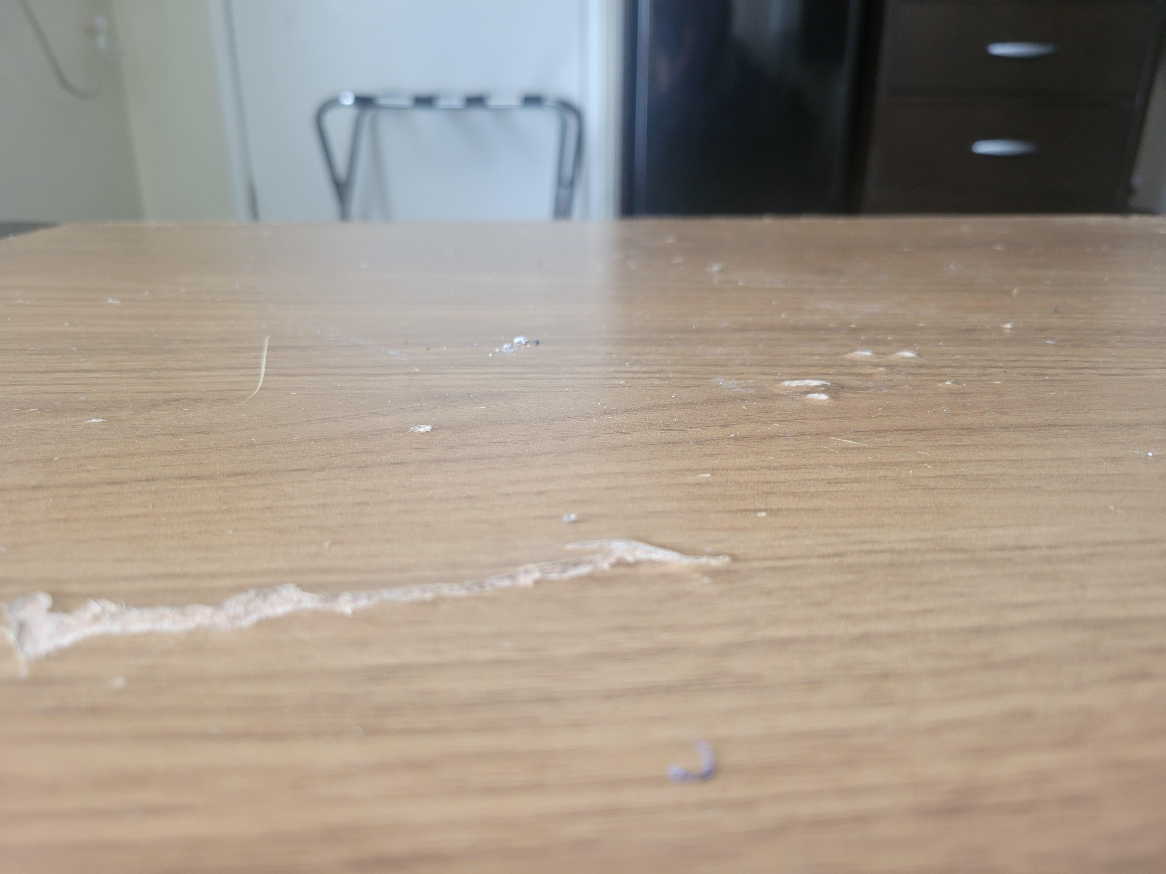 Cuts and various damage on the table