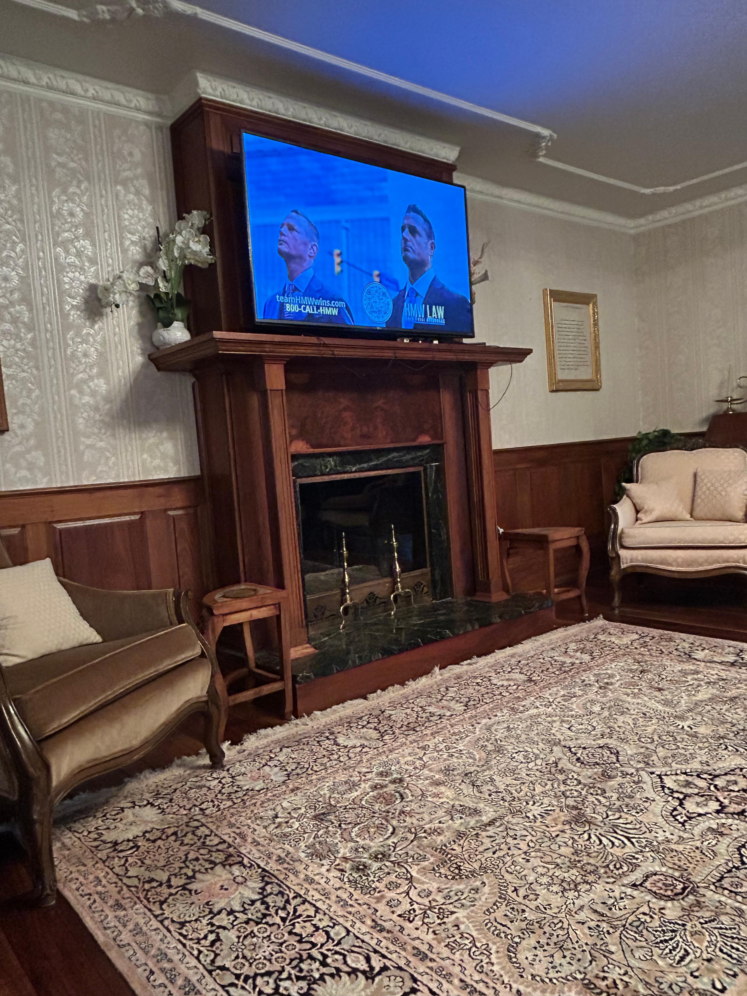 Fireplace that heats two separate rooms with one fire