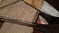 Carpet falling out of the stairs causing a trip hazard.
