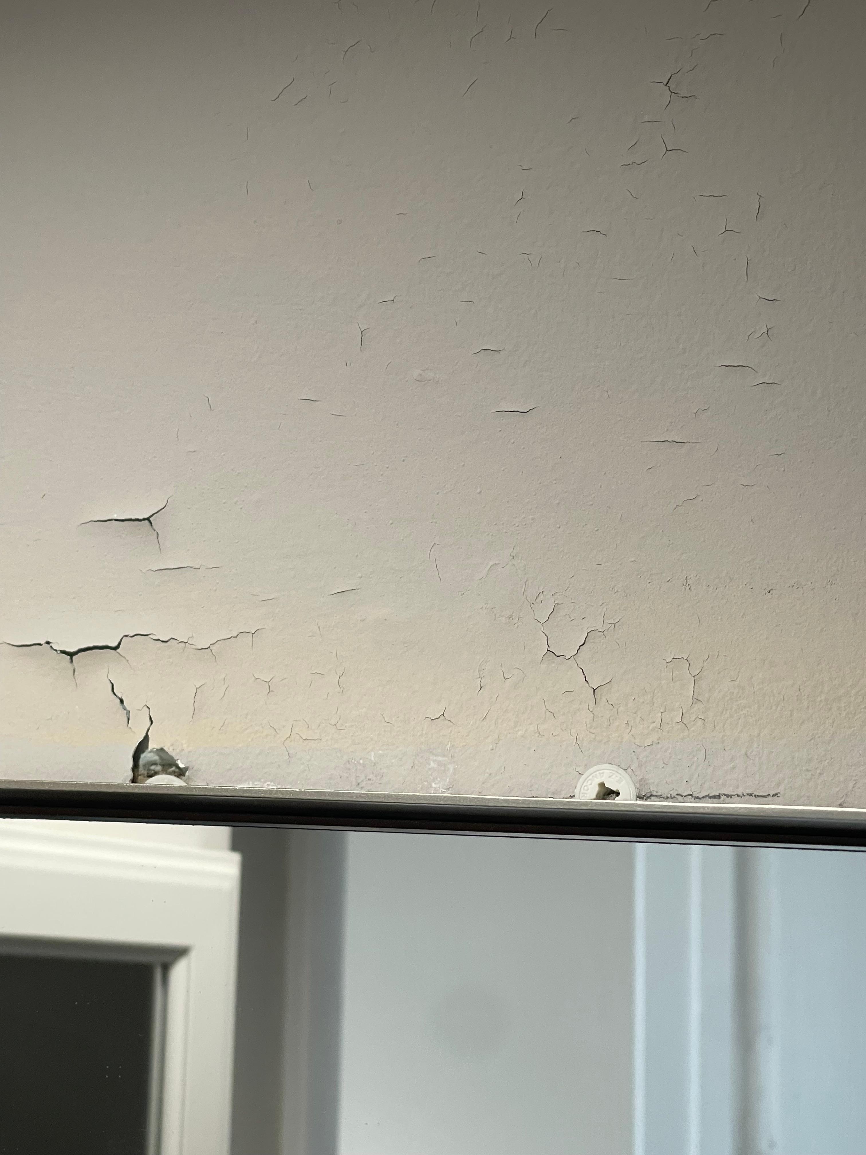 Wall paint peeling all over condo
