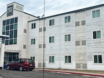 Walls of building showing throu paint