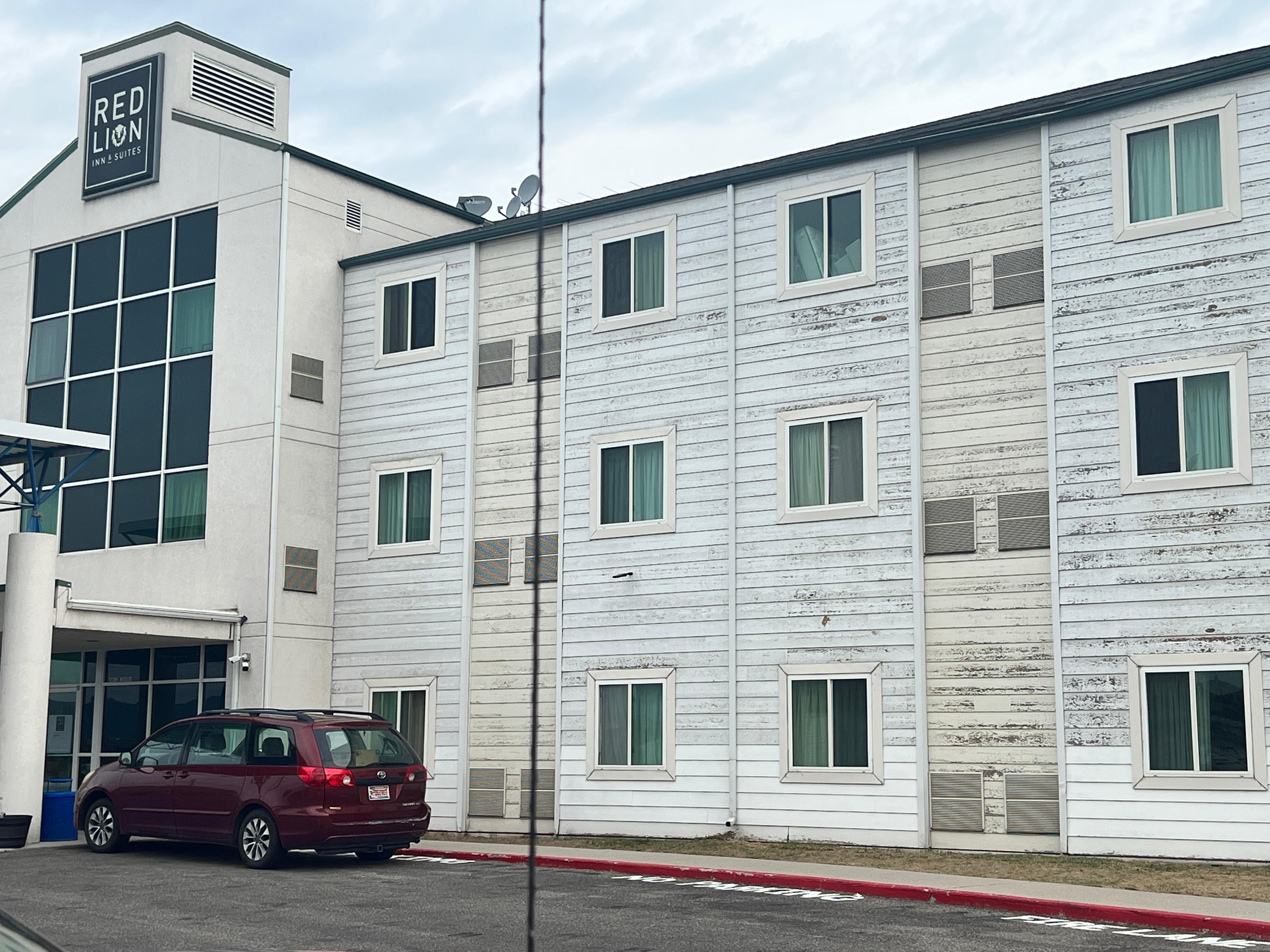 Walls of building showing throu paint