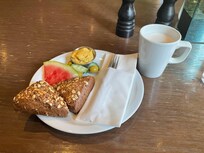 Vegan Breakfast. I had the hummus on a bread rolls and some vegetables. The coffee machine offered oat milk options, which was also available for tea.