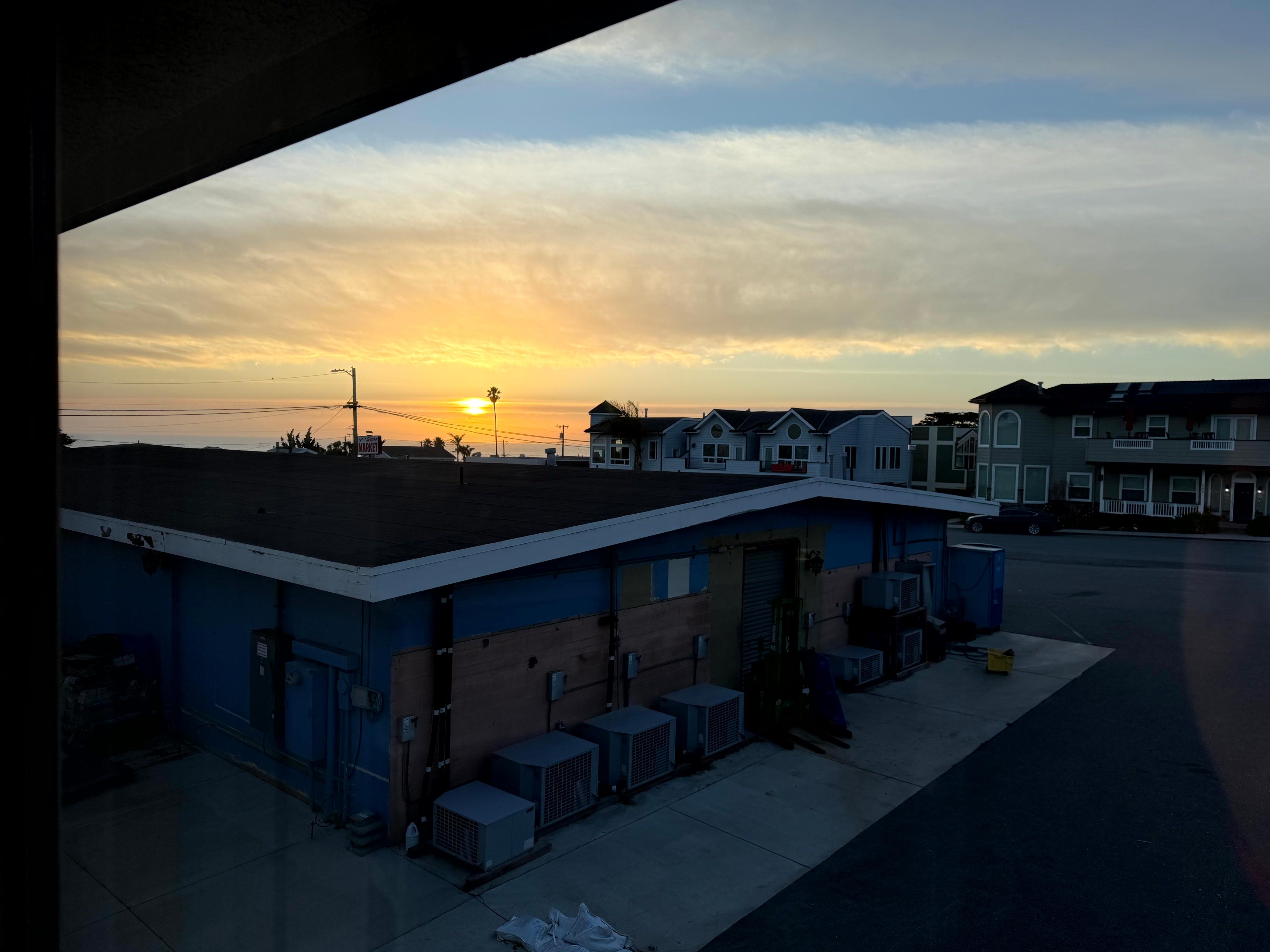 View from the back window of our room at sunset