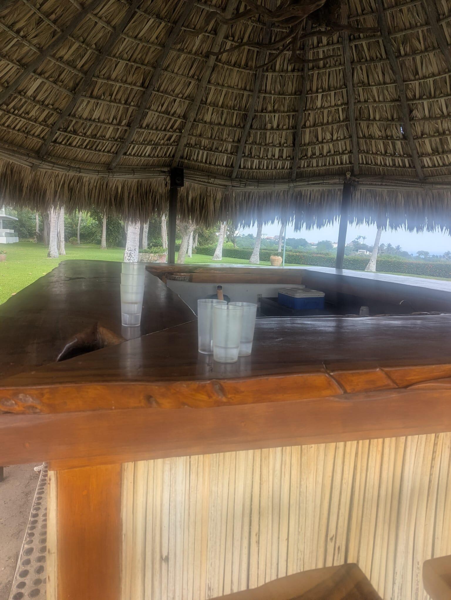 Used cups left on bar