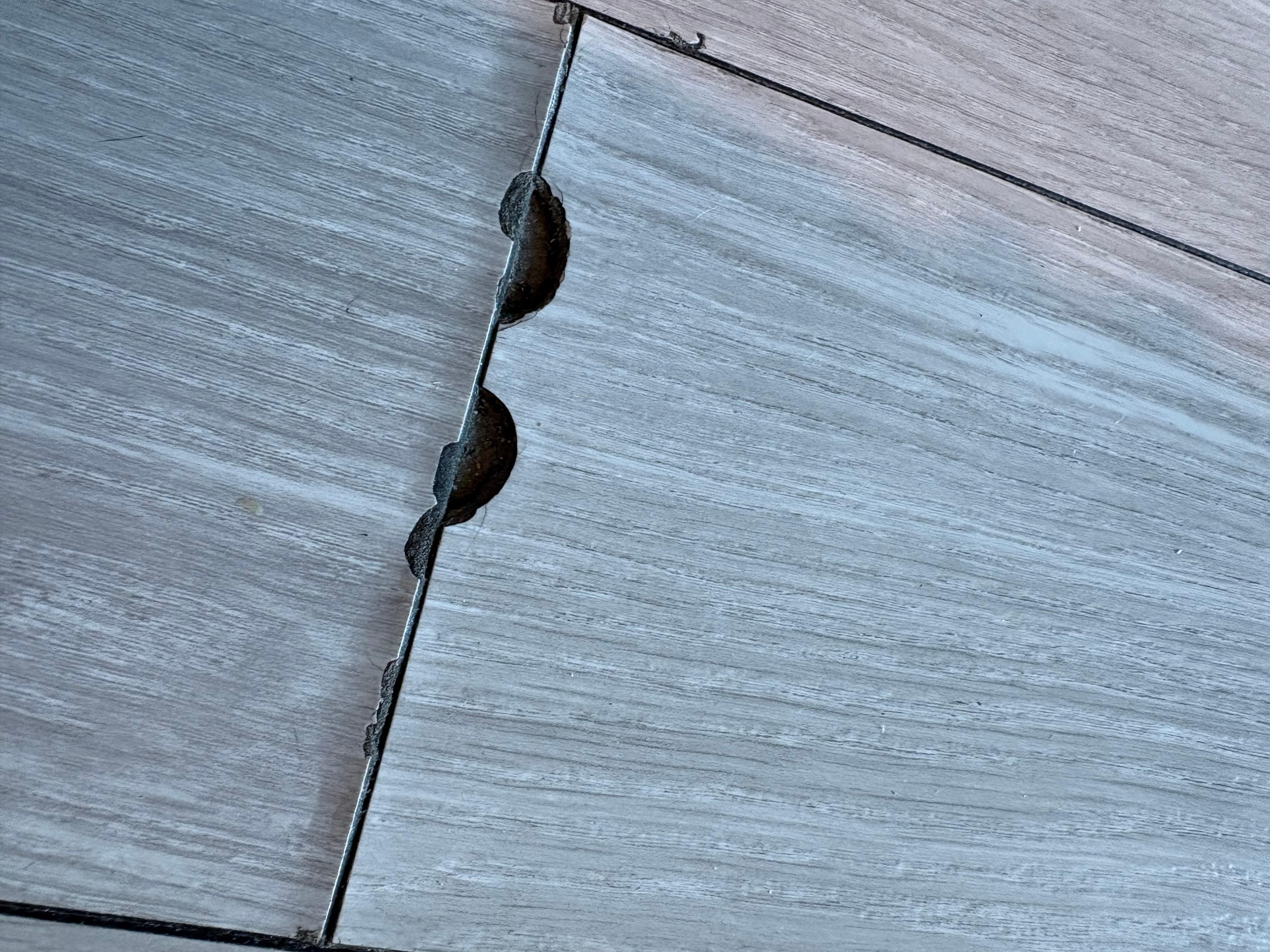 Cheap flooring peeling up, marred