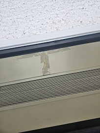 This is more about the roof, but man, taped up and cracked laminate just looks bad.