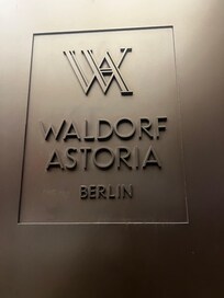Wall sign on pillars of the hotel entrance