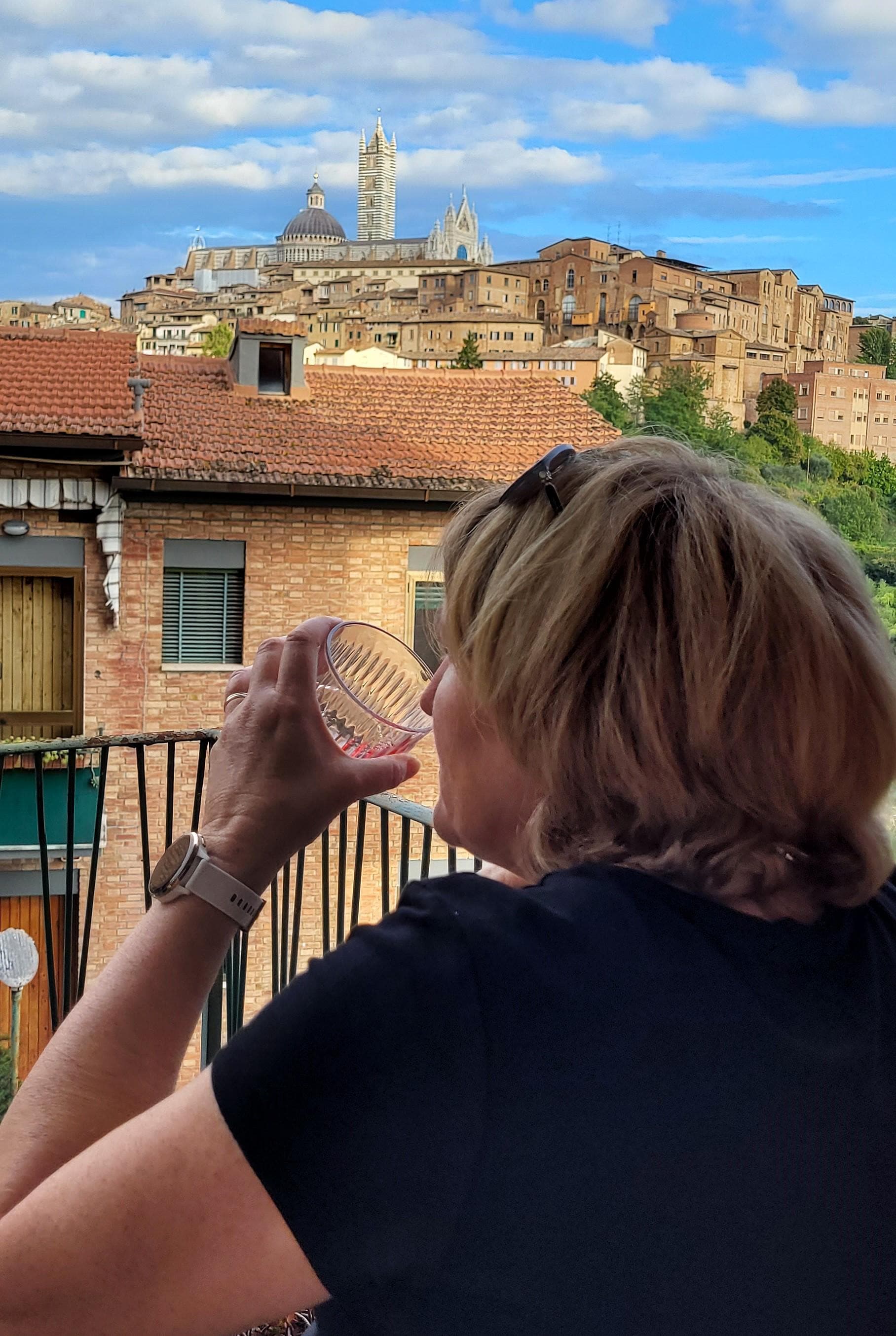 Enjoying a quiet afternoon on the balcony off the living room.