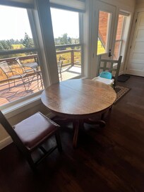 View of the deck and staircase is to the right.