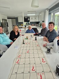 Playing games in the open plan kitchen, diner, sofa area...