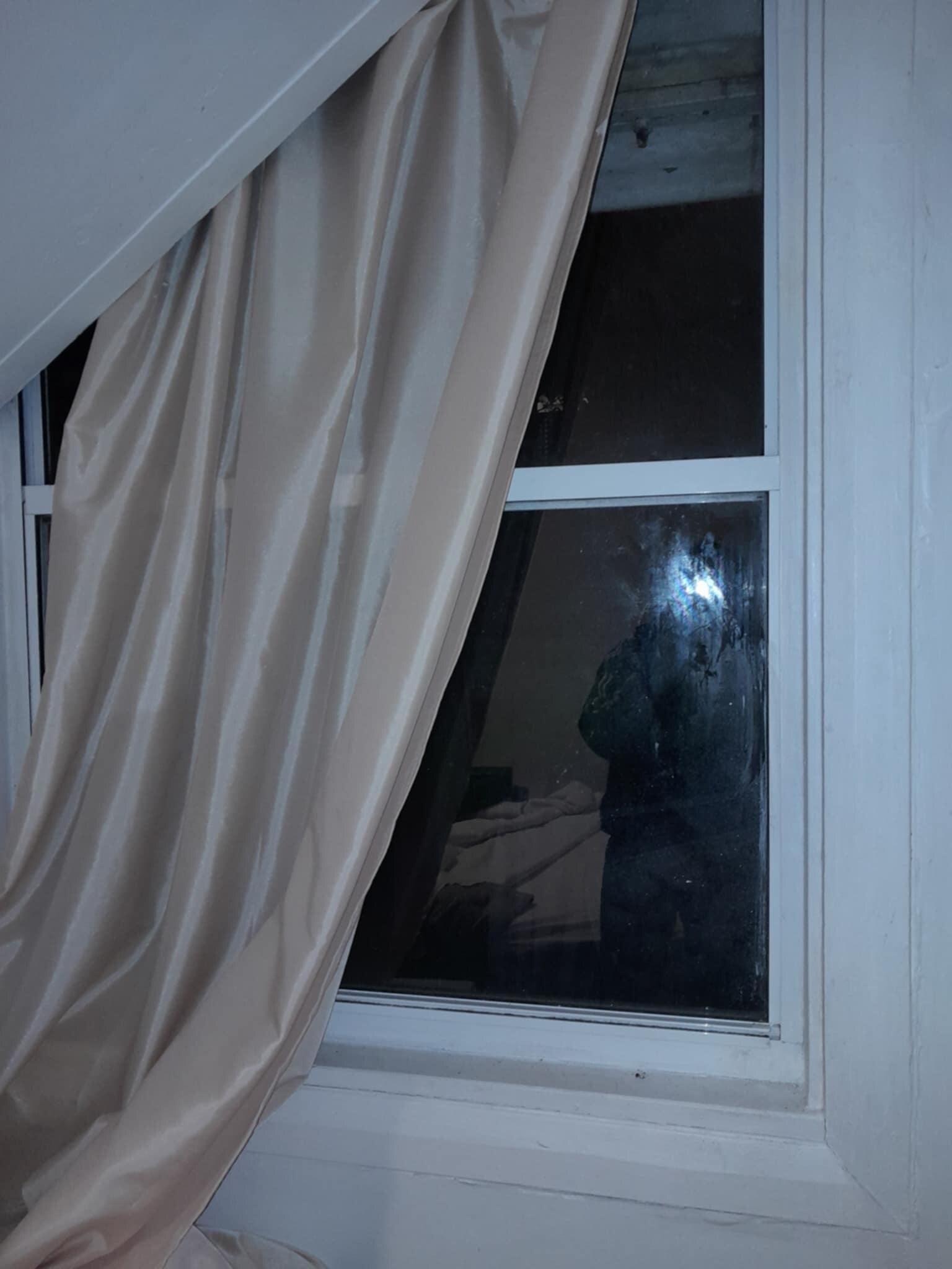 The window that cannot be opned because there is no screen and the curtain that has never been washed