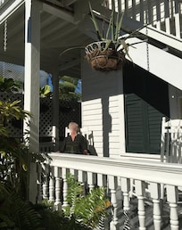 Charming white rocking chairs around every corner of this old wooden house invite you to enjoy the winter sunshine whenever you want