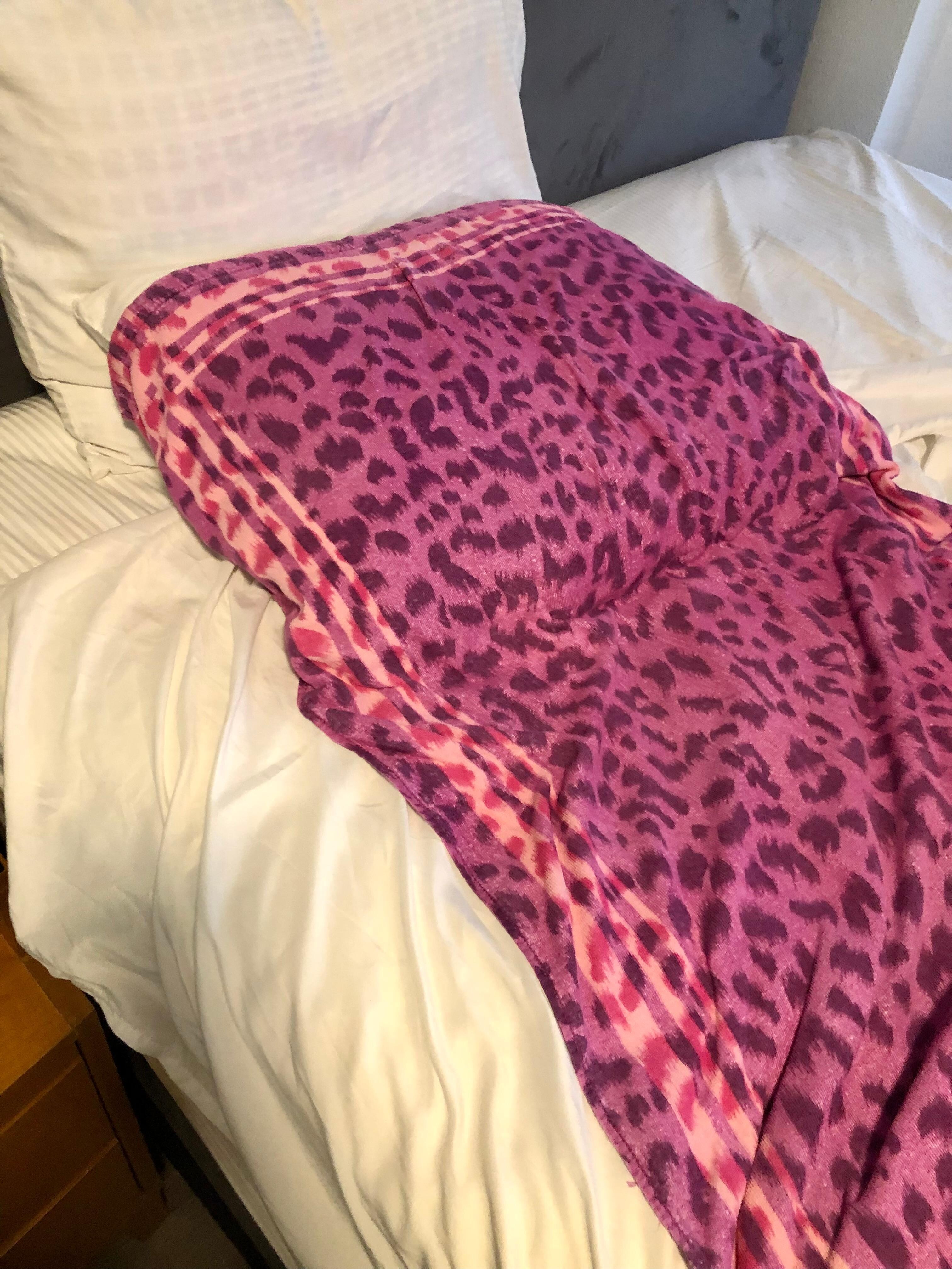 I had to sleep on my beach towel the sheets were so gross