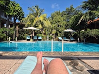 Relaxing by the pool