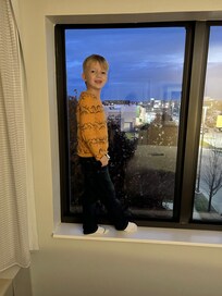 Looking out at the busy shoppers from our window