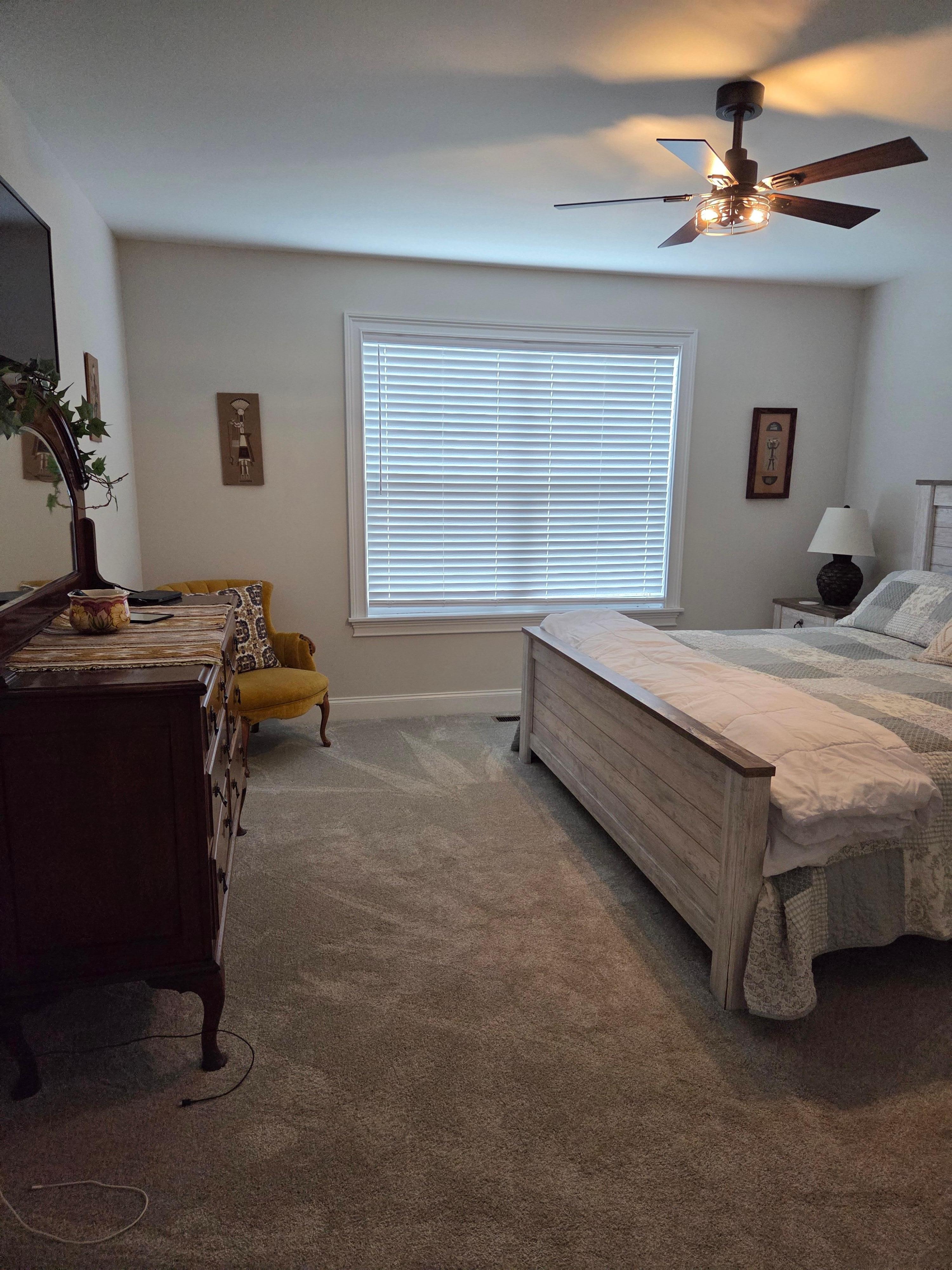 Master Bedroom with large dresser and storage.