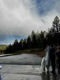 After the wedding everyone was in the reception area and it started to to rain and gave my daughter and her husband a beautiful rainbow. They almost missed it!
