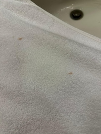 Fresh towel has nasty stain on it