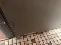 Large hole at bottom of bathroom door