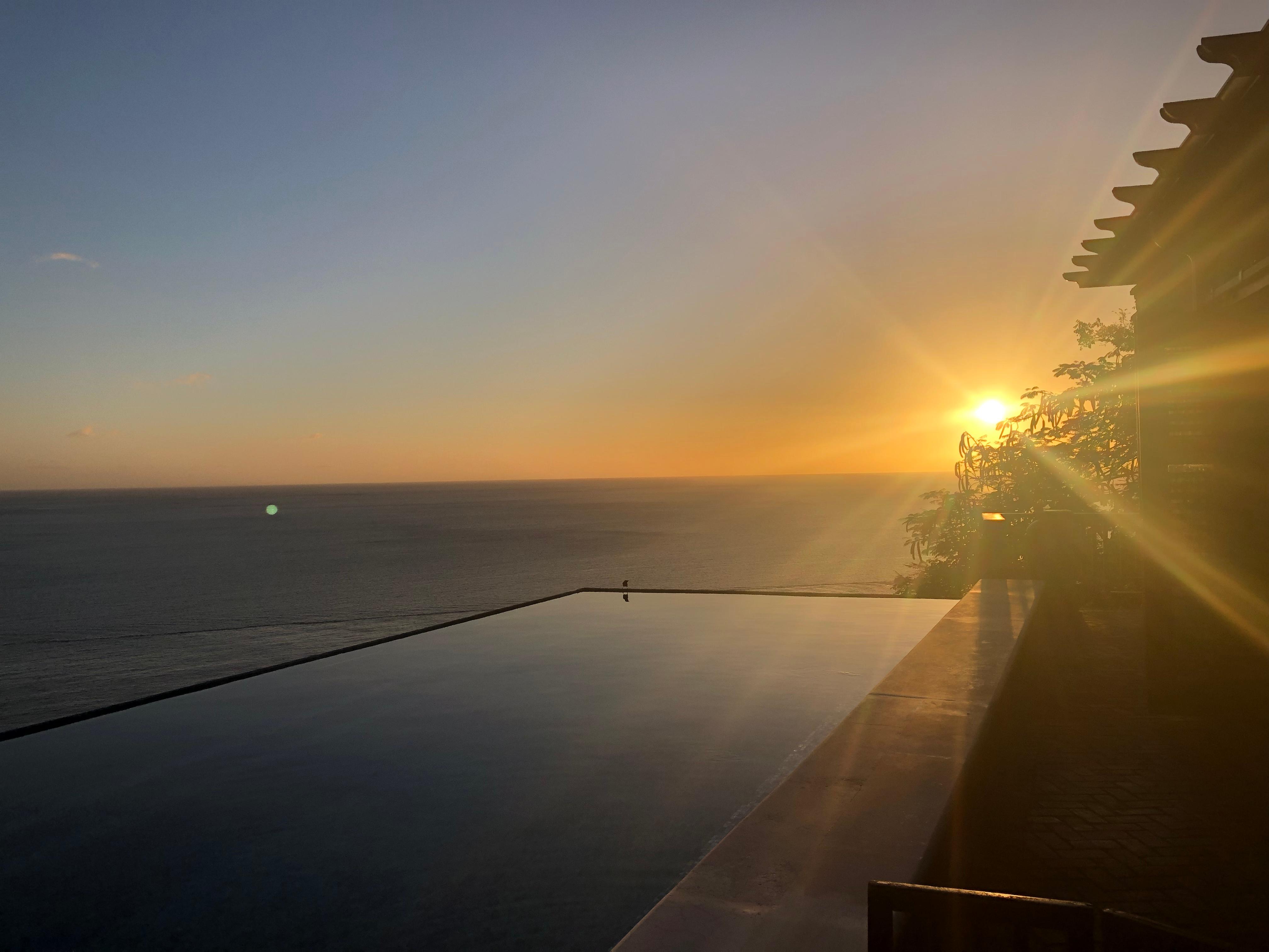 Sunset over infinity pool