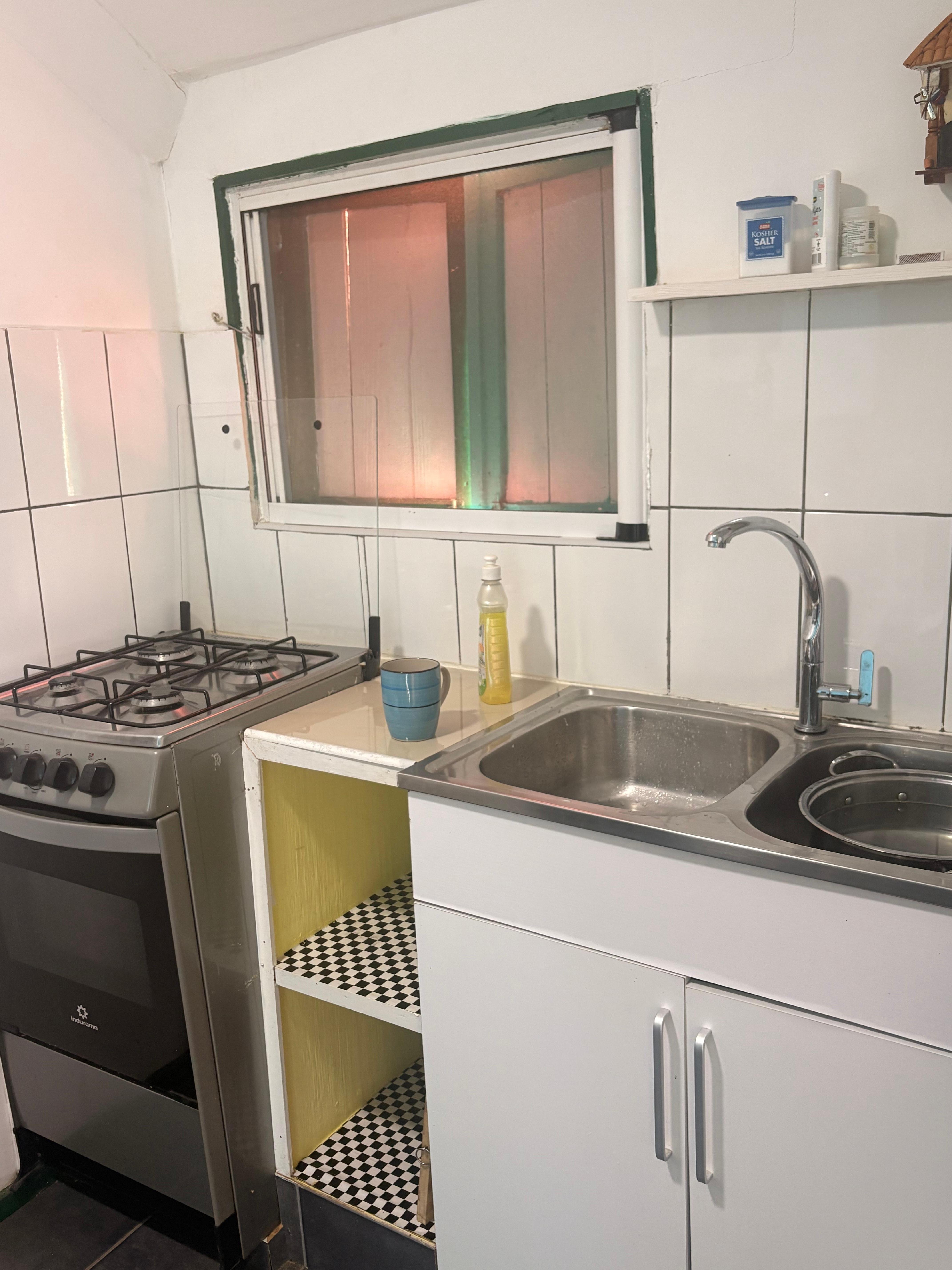 Kitchen area of apt. 14.  
