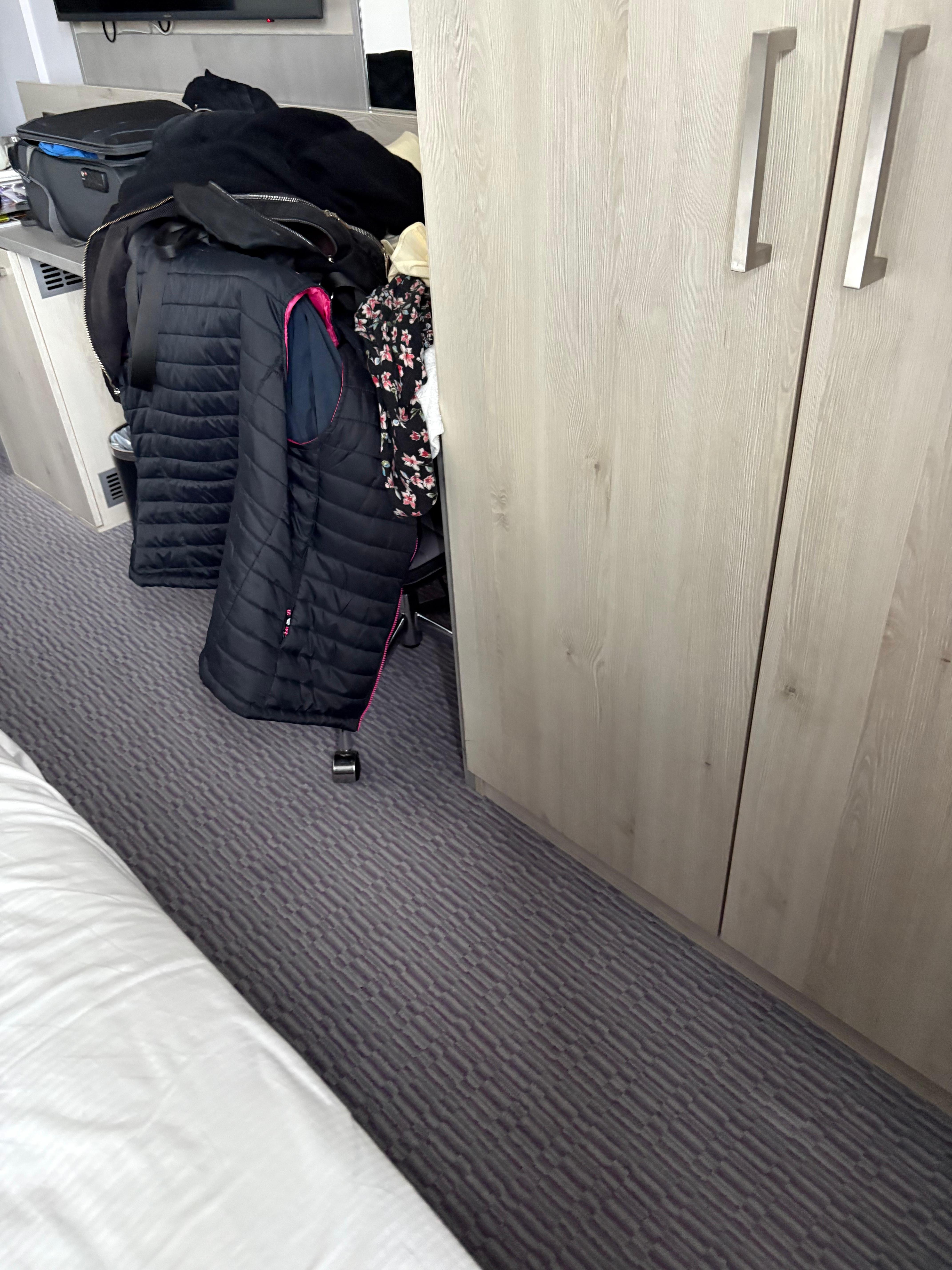 Space between bed & wardrom. Difficult for 2 people to pass 