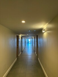 One of the pools and beach are at the end of the hallway of Building 3