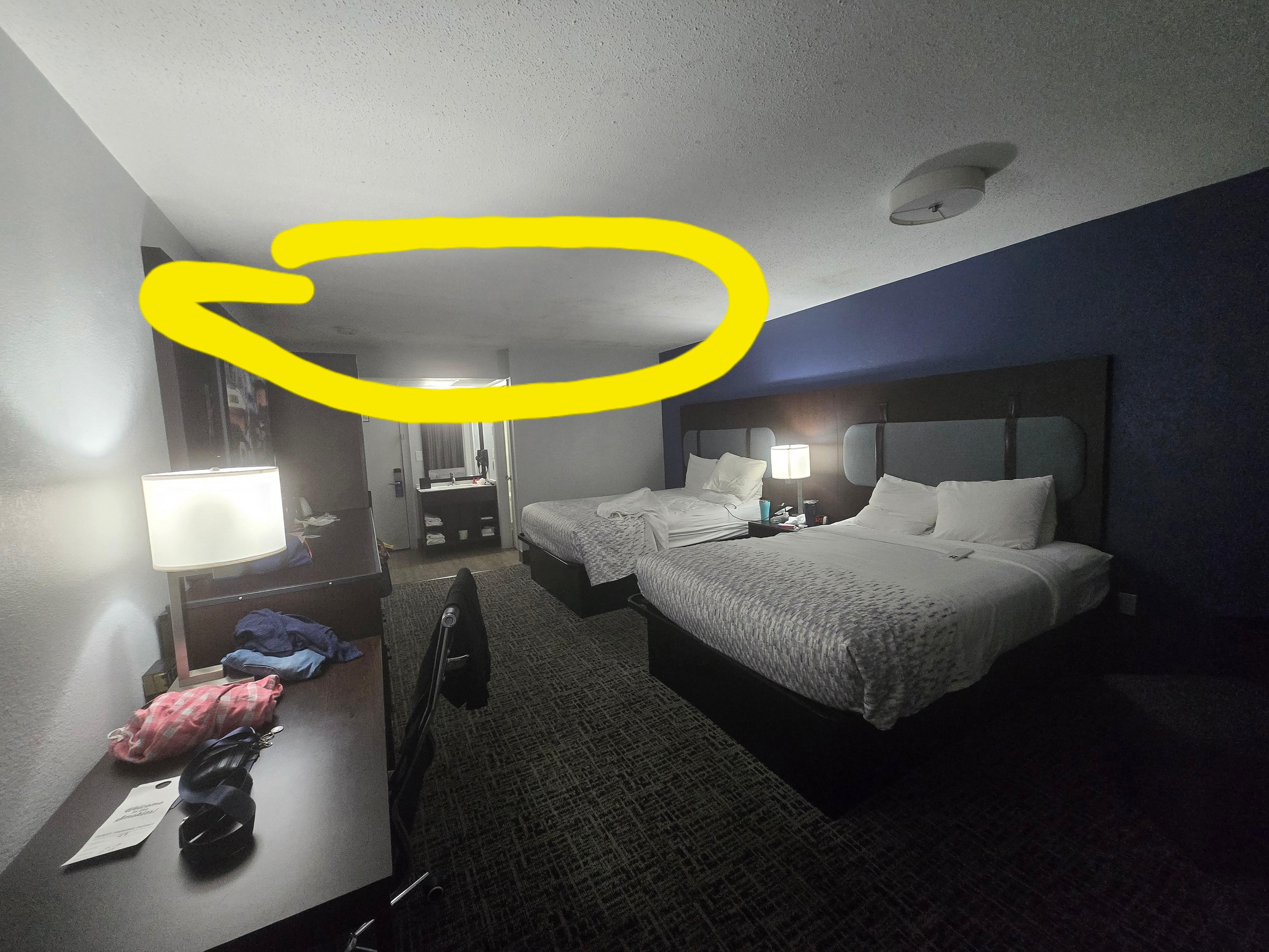 A black something on the ceiling. 