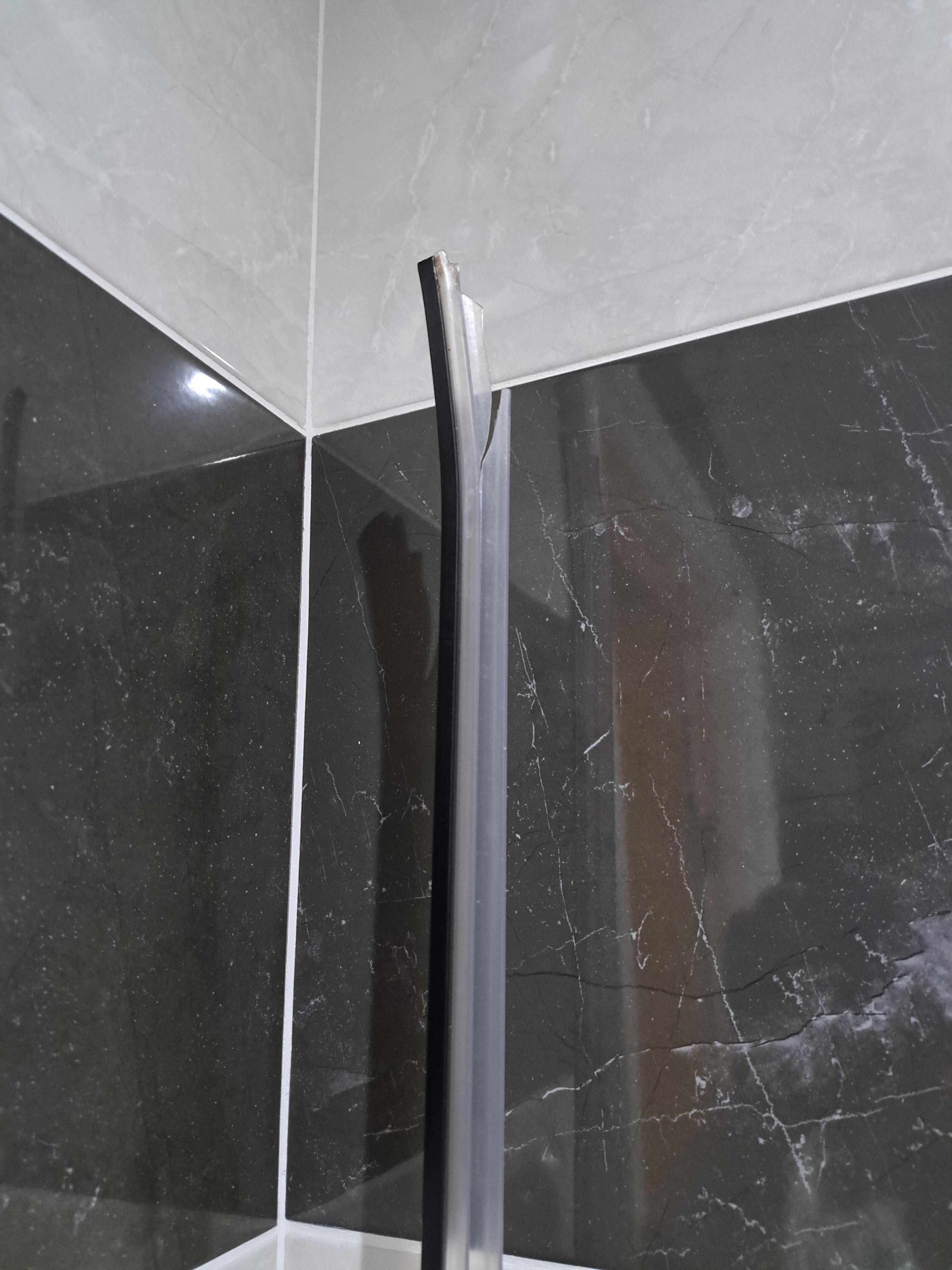 Broken part of shower just left in room