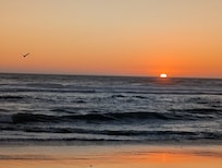 Sunset from beach just below the condo