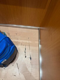 Dirty floor with roof tar.