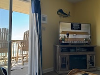 Watching our church service while listening to the waves